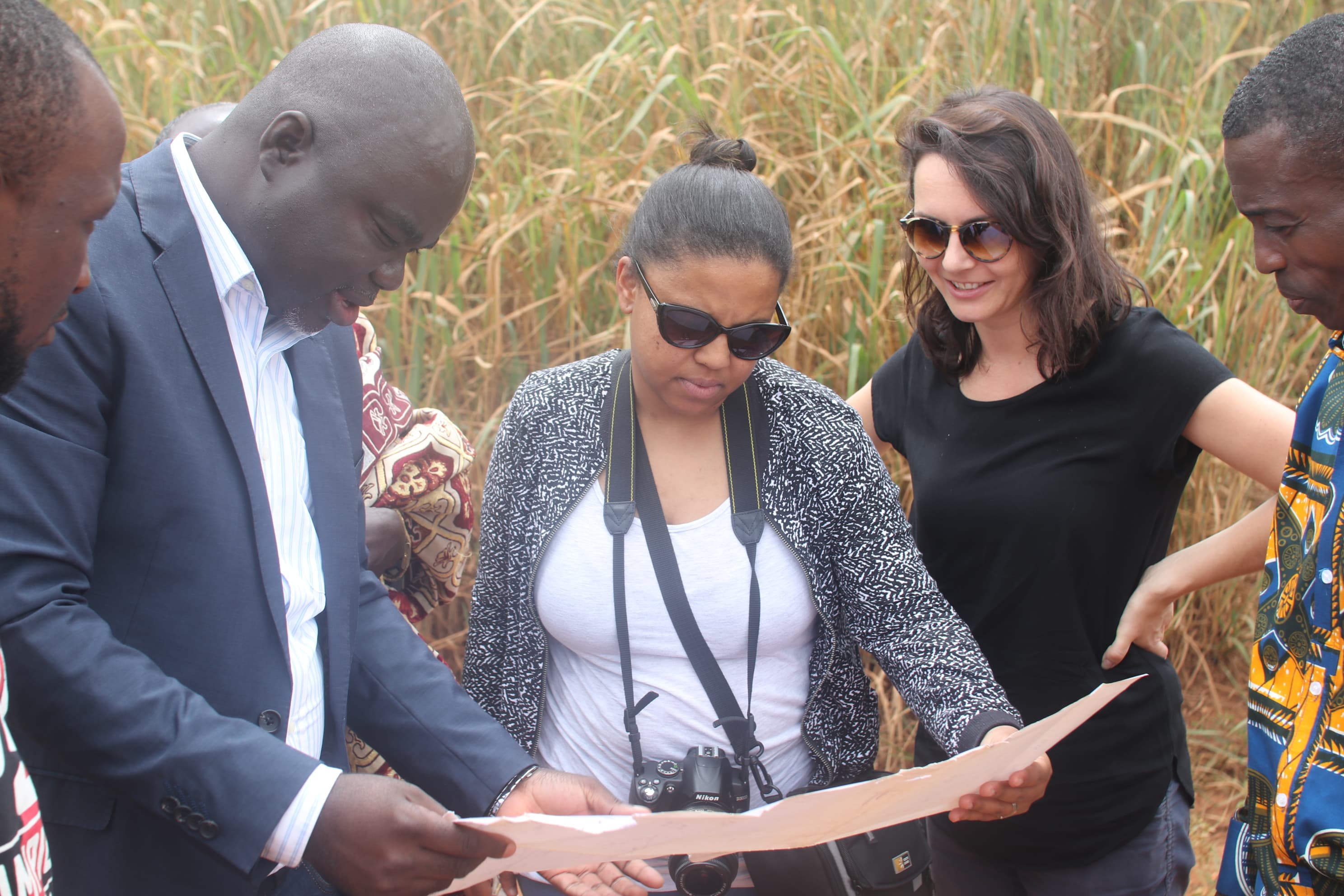 Community gathering at the Sunyani centre development site